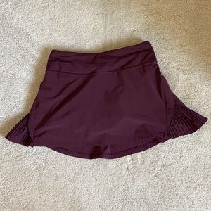 Play Off the Pleats Mid Rise Skirt
